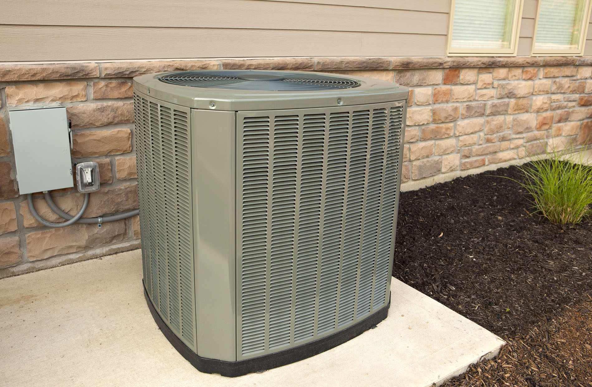 Outdoor unit of a high efficiency air conditioner or heat pump.