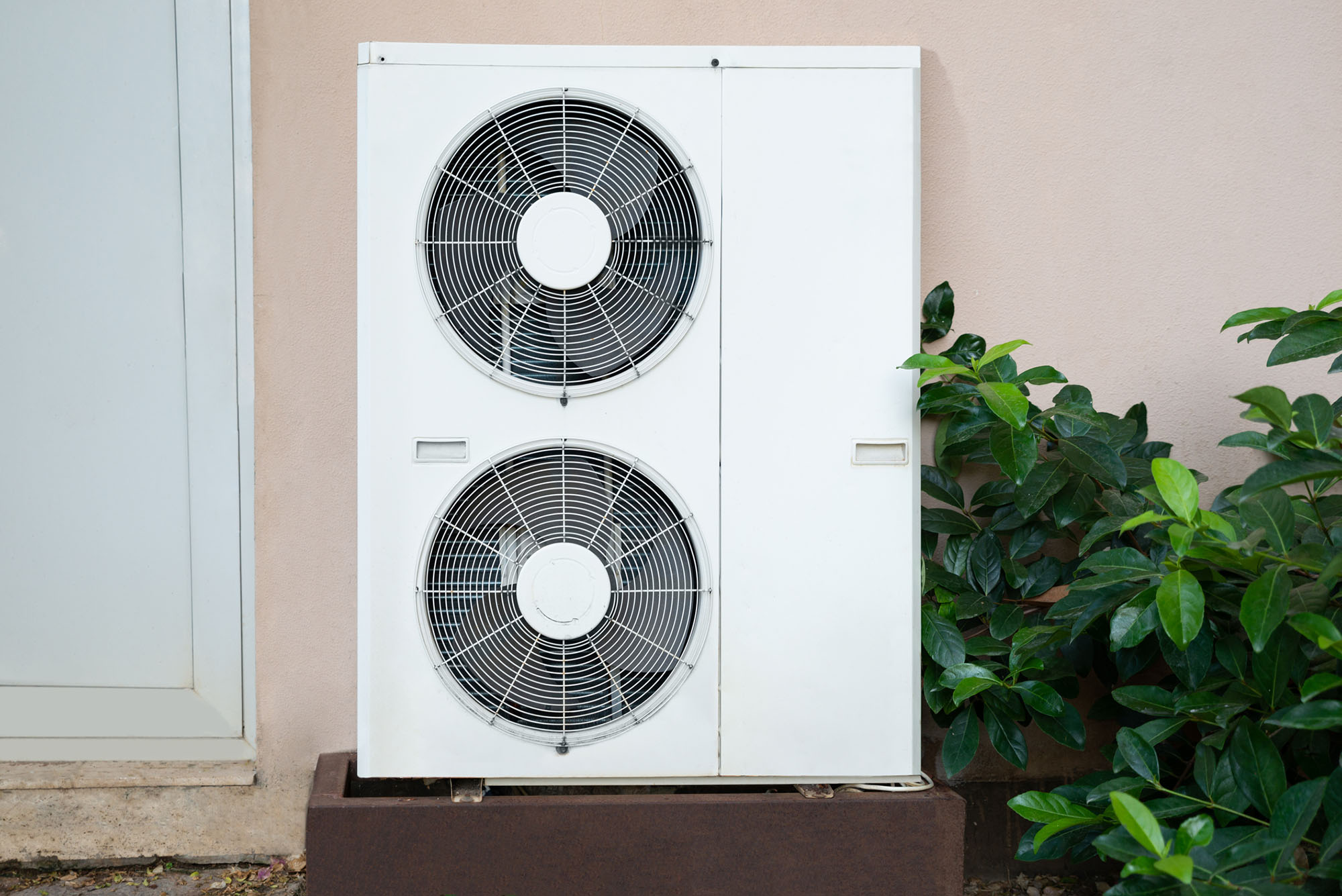 Air Conditioner Unit Standing Outside Of The House